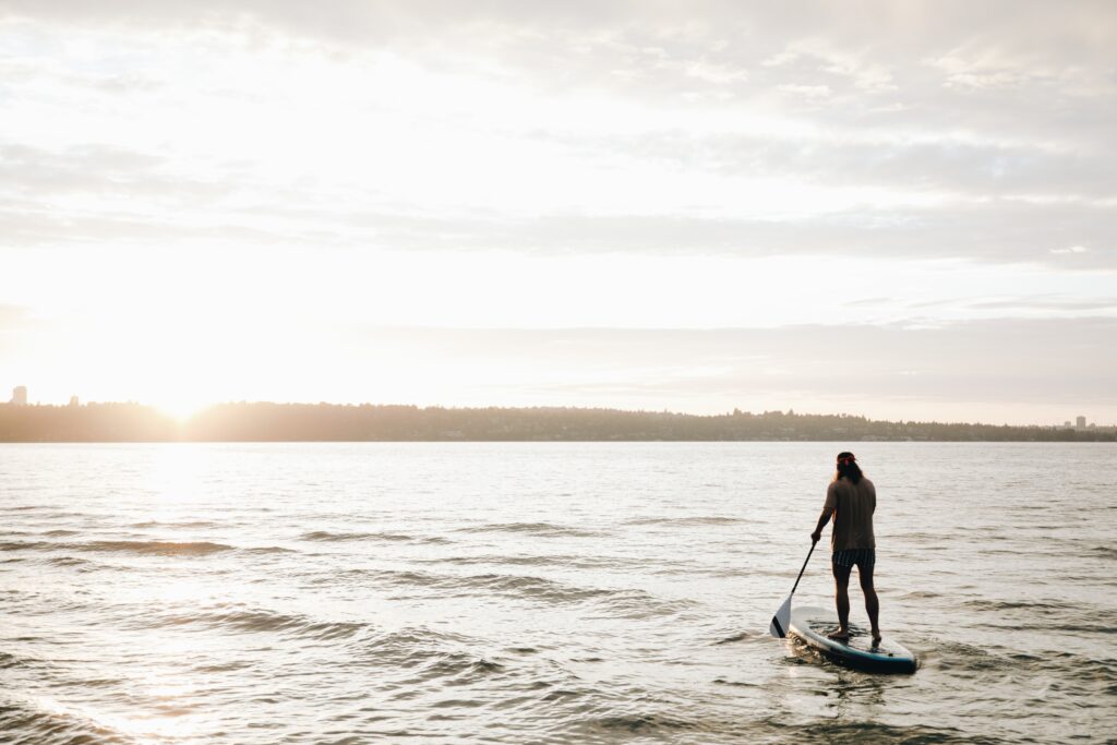 A person enjoying paddleboarding.